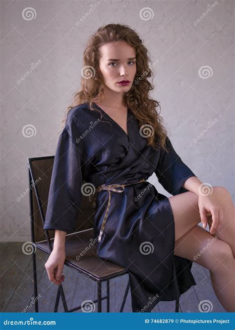 Woman In Silk Bathrobe Sitting On A Chair Stock Image Image Of Blond