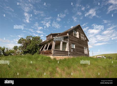 Abandoned Farmhouse On The Open Prairie In Southern Saskatchewan Stock