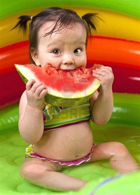 Baby Girl Eating Watermelon In Wading Pool Beautiful