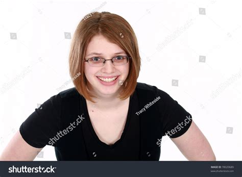 Real Teen Girl With Short Hair And Glasses In Studio