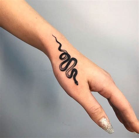 Small Snake Black Work Tattoo On The Hand Small Hand Tattoos Small