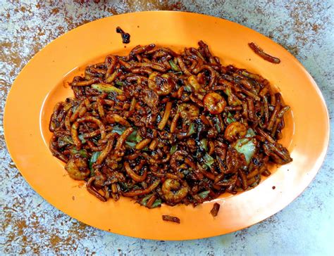 Hokkien mee includes a mixture of both yellow egg noodles and white rice noodles that are fried in a wok with egg, often pieces of seafood, usually squid and shrimp, and bean sprouts. Kuala Lumpur Ah Wah Hokkien Mee, Paramount Garden - Asia ...