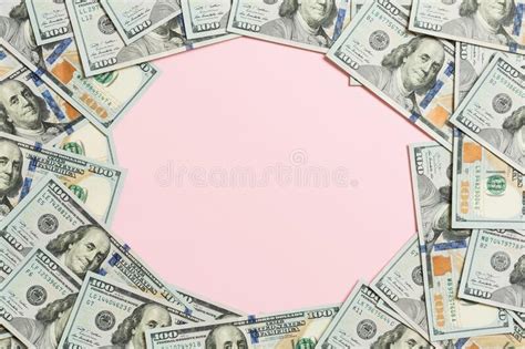 Frame Of One Hundred Dollar Bills With Stack Of Money In