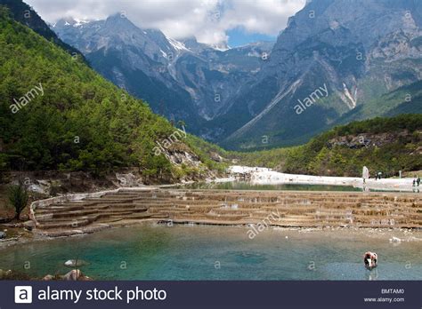 The highest of yulong xueshan's peaks is more than 18,000 feet above sea level. Yulong Xueshan (Jade Dragon) Mountain near Lijiang Yunnan ...