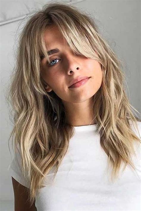 If they grow out, they usually just start to blend into your haircut, says hairstylist kathleen riley, who especially loves the look paired with a ponytail or tousled bun. Layered Haircuts with Bangs 20 Pics | Hairstyles and ...
