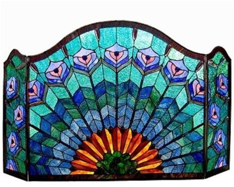 The stained glass pane is crafted with 423 pieces of. This Tiffany-style Peacock design Fireplace Screen features an attractive finish. This fi ...