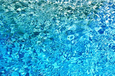 Seamless Pattern Of Blue Water With Reflections Texture Background