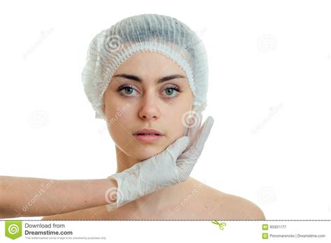 Doctor Touches A Person In A White Glove A Young Pretty Girl In Cap