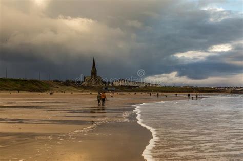 People Taking A Walk On Tynemouth S Longsands Beach During Lockdown On
