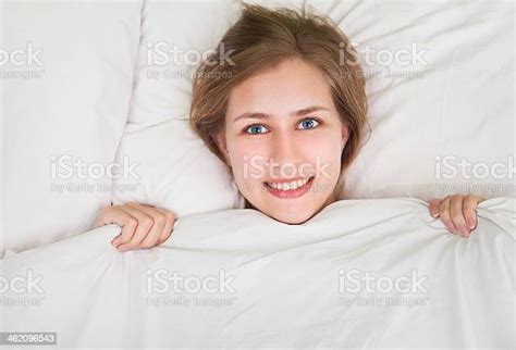 Portrait Of Young Beautiful Woman In Bed Stock Photo Download Image