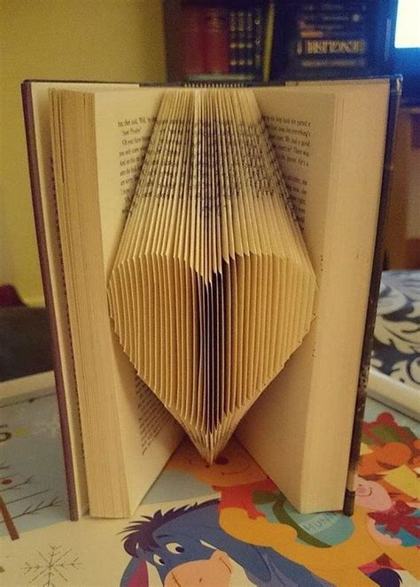 30 Diy Projects Made With Old Books Book Art Tutorial Old Book