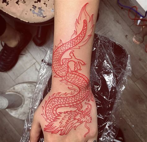 𝐩𝐢𝐧 𝐞𝐫𝐢𝐚𝐧𝐚𝐬𝐝𝐢𝐯𝐢𝐧𝐢𝐭𝐲 Dragon hand tattoo Red tattoos Red ink tattoos