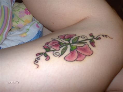 Cute Sweet Pea Flowers Tattoo Design For Girls Tattoomagz › Tattoo