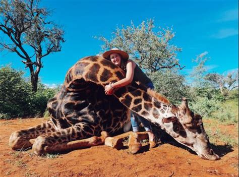 Influencer Receives Backlash For Posing With The Heart Of A Giraffe She Hunted For Valentines