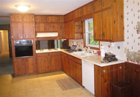 Remodelaholic kitchen renovation updating knotty pine cabinets. Amber's 1961 knotty pine kitchen before and after Retro ...