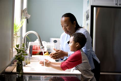 Free Picture African American Mother Shown Process Teaching Young Son Wash