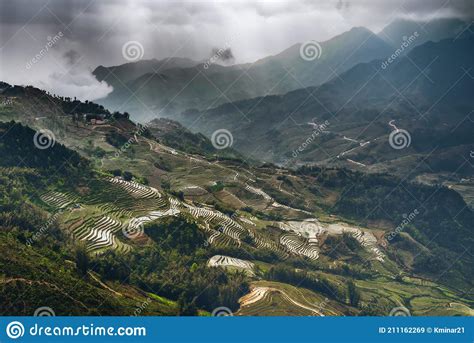 North Vietnam Rice Fields Gloomy Day With Bursts Of Light Illuminating