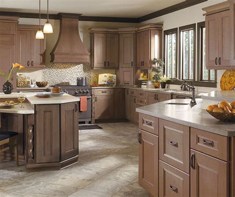 And no matter how you want it, many expert cabinetries will be more than happy to help fulfilling your taste and style over these cherry kitchen cabinets. Kitchen with Cherry Cabinets - MasterBrand