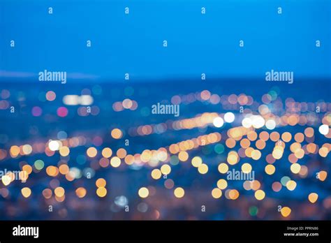 Beautiful City Blurring Lights Abstract Circular Bokeh On Blue
