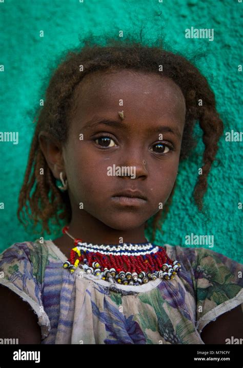 Portrait Of A Beautiful Afar Tribe Girl Wearing A Beaded Necklace Afar