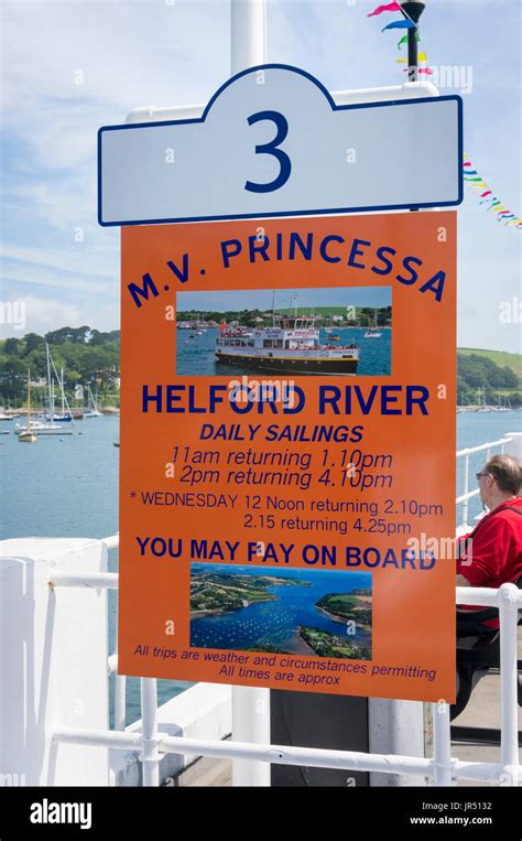 Sign At Falmouth Pier For The Daily Ferry Trip Up The Helford River