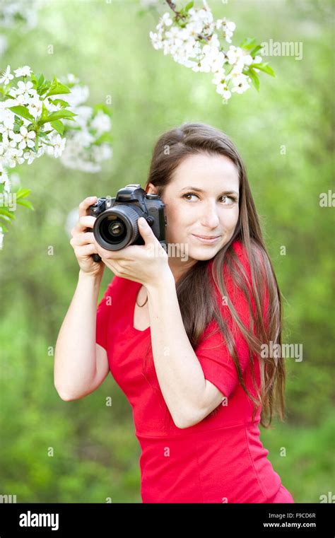 Photographer Woman Is Taking Photos In Green Park Stock Photo Alamy