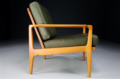 Midcentury Danish Lounge Chairs By Arne Wahl Iversen In Green Leather