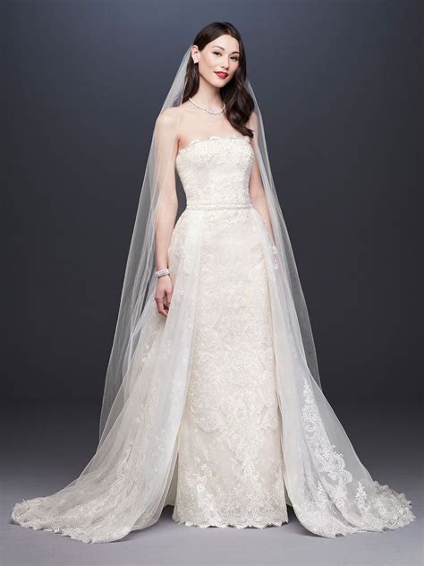 Oleg Cassini Spring Bridal Collection Strapless Lace Wedding Dress With Scalloped Hem And
