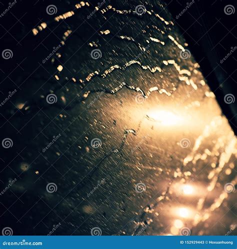 Rain Drop On Window Traffic Light At Night Make Bokeh Stock Image