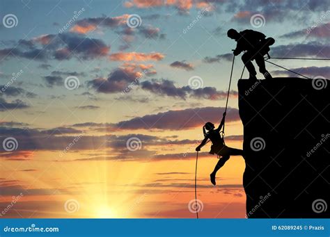 Silhouette Of Two Climbers Stock Image Image Of Topman 62089245