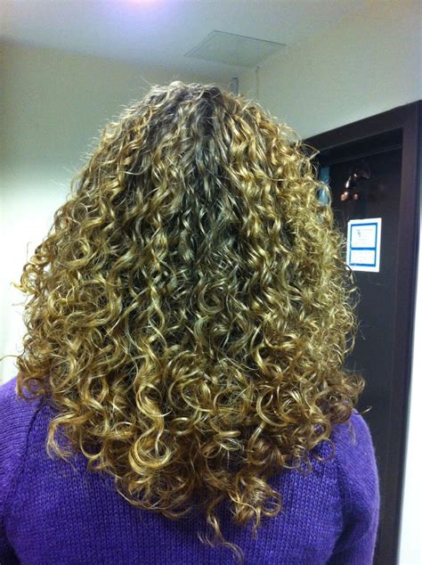 Medium Length Tight Curls Highlights Permed Hairstyles Curly Hair