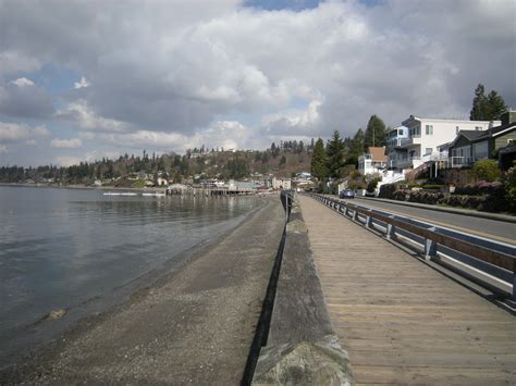 Scenic Boardwalk At Redondo Beach Which Has Its Own Small Pier And Boat