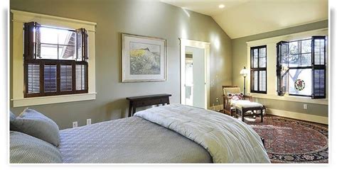 Wood and faux wood shutters are a window covering style that's perfect for traditional homes. Beautiful stained traditional shutters from http://www ...