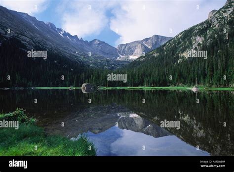 Alpine Reflections In A Lake High In Colorado Rocky Mountains Stock