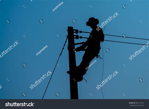 Electrician Silhouette On Blue Background Stock Photo 396121552