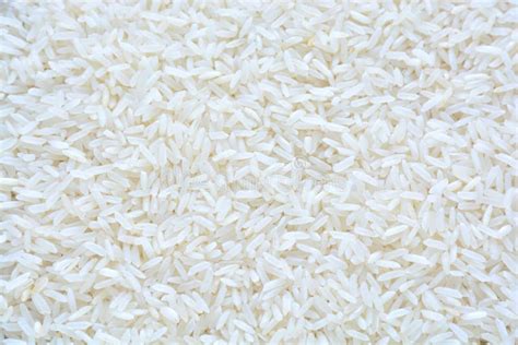 Basmati White Rice Solid Texture Top View Close Up On Raw Rice Grains