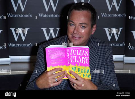 julian clary signing copies of his debut novel murder most fab at waterstones piccadilly