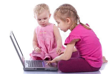 Kids Playing Computer Game On Laptop Stock Photo Image Of Casual