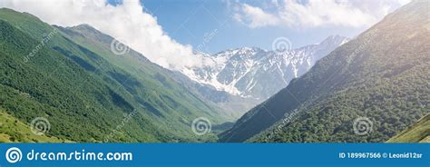 Mountain Landscape With Green Meadow Mountains Valley Panorama Of