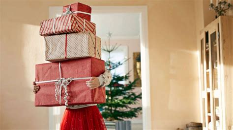Present definition, being, existing, or occurring at this time or now; Momtroversy: How many Christmas presents should you give ...
