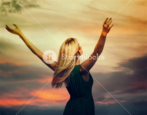 beautiful woman  arms open wide  sunset royalty  stock image storyblocks