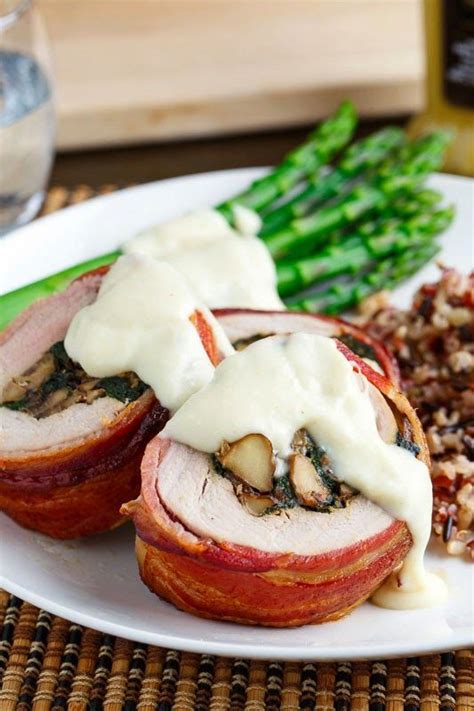 Bacon Wrapped Mushroom And Spinach Stuffed Pork Tenderloin In A Creamy