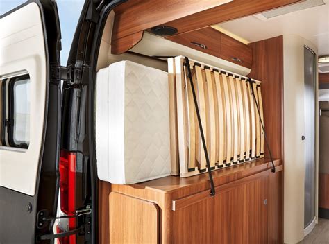 Some also have storage space at the sides and a portable toilet hidden away. Snappy camper van slims and swings to make the most of space | Camper van, Camper, Camper beds