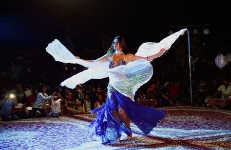 Desert Safari With Bbq Dinner Belly Dance And Tannura Dance Getyourguide
