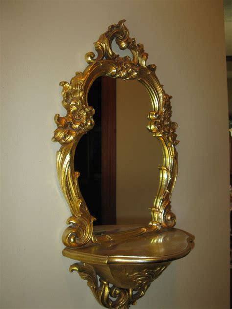 Impression of luxury in the bathroom mirror with shelf. Dart wall mirror with shelf - vintage- gold frame-Syroco ...