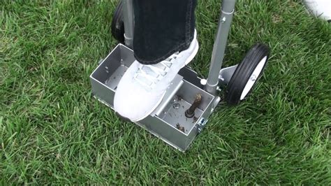 Aerating your lawn doesn't need to be done often but it's still an important part of lawn care. Step N Tilt Lawn Core Aerator with Container - YouTube