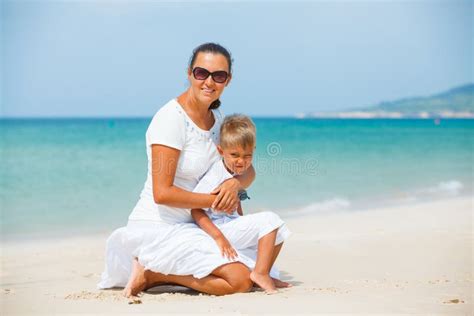 Mother And Son Having Fun On The Beach Stock Photo Image Of Mother