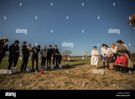Men And Women Celebrating Easter In Traditional Way In A Village In