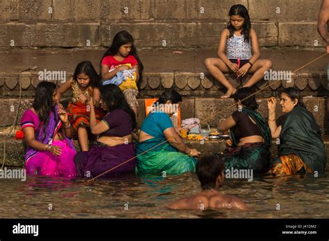 Women Bathing In The Sacred Waters Of The Ganges River Varanasi India Stock Photo Alamy