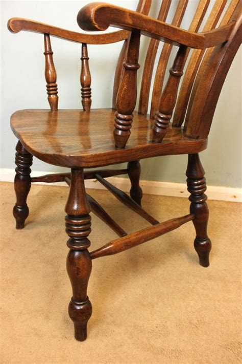 The young lad holds a bat, has a jersey, and has a cap, and on the spine another lad is. Antique Country Windsor / Grandfather Chair | 342724 ...